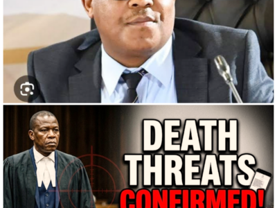 ASSASSINS AT THE GATE: THE TERRIFYING SIEGE OF COMMISSIONER KHUMALO AS DEATH THREATS ROCK THE ESTABLISHMENT! POLICE HAVE OFFICIALLY TRIGGERED CODE RED AFTER DISCOVERING A SINISTER MAP OF THE COMMISSIONER’S PRIVATE RESIDENCE IN THE HANDS OF A KNOWN EXECUTIONER! AS THE FAMILY HUDDLES IN FEAR BEHIND BULLETPROOF GLASS, THE SENSATIONAL REVELATIONS OF A GOVERNMENT COVER-UP BEGIN TO EMERGE! IS KHUMALO BEING SACRIFICED TO PROTECT A LARGER CONSPIRACY? THE DRAMA IS EXPLOSIVE AS THE HEAVY GUARD PREPARES FOR A MIDNIGHT RAID THAT COULD CHANGE THE FACE OF JUSTICE FOREVER! PREPARE FOR A BLOODBATH IN THE SUBURBS!-ZZ Tonight, the manicured lawns of the elite have become a battlefield as Commissioner Khumalo fights for his life against a shadowy cabal determined to see him in a casket. It’s a sensational story of courage under fire and the brutal reality of a man who stood too tall, only to find himself in the crosshairs of a conspiracy so vast it threatens to incinerate everything he holds dear in a flash of muzzle fire.  The full story is in the comments below.